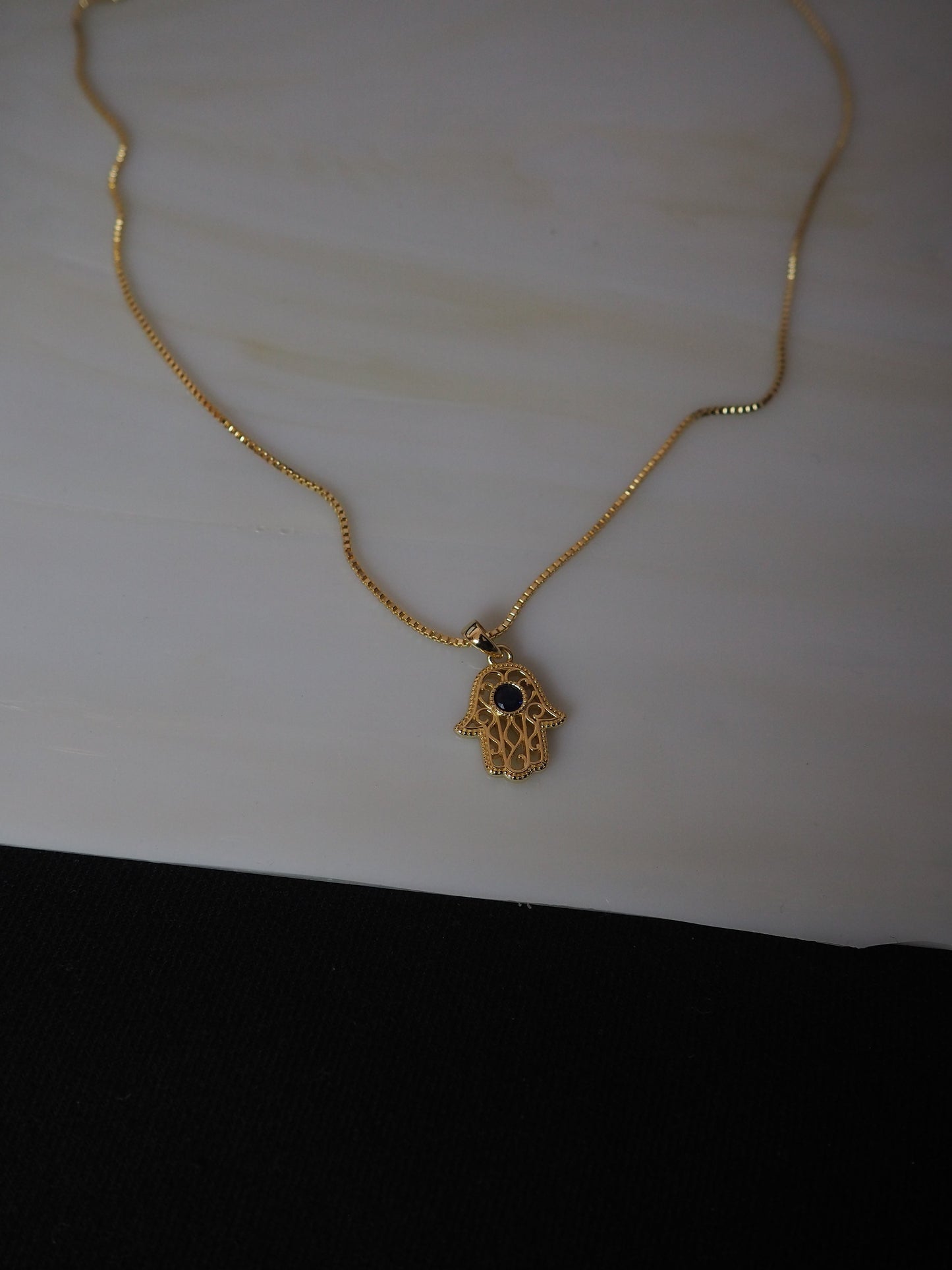 Sapphire hamsa necklace