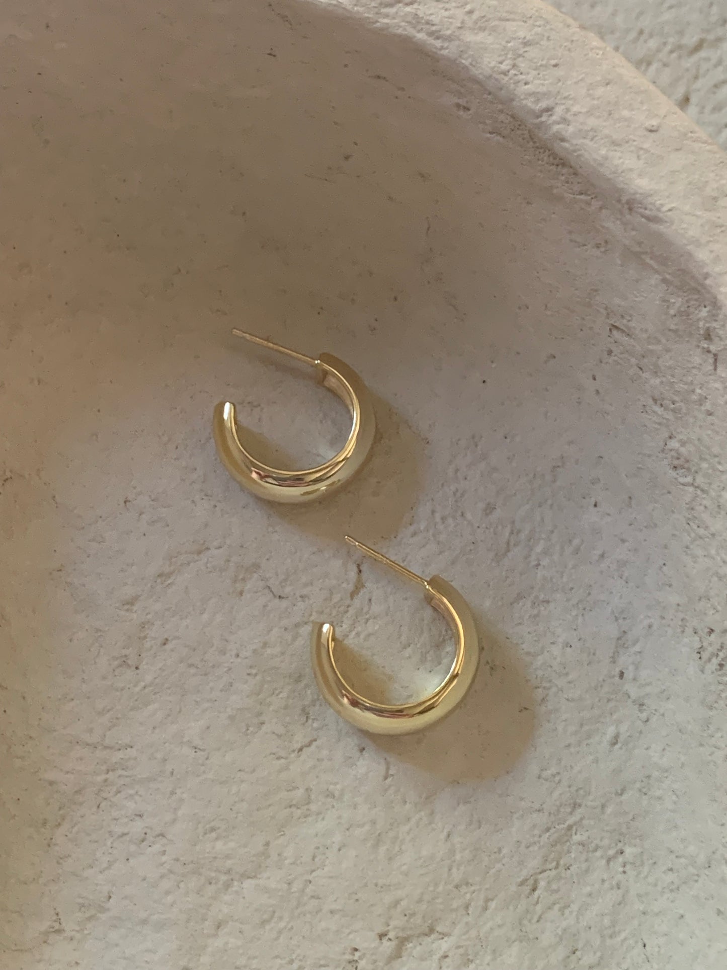 Golden hoops earrings