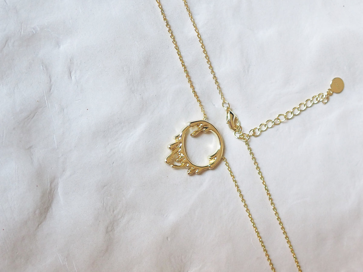 Gold drip necklace