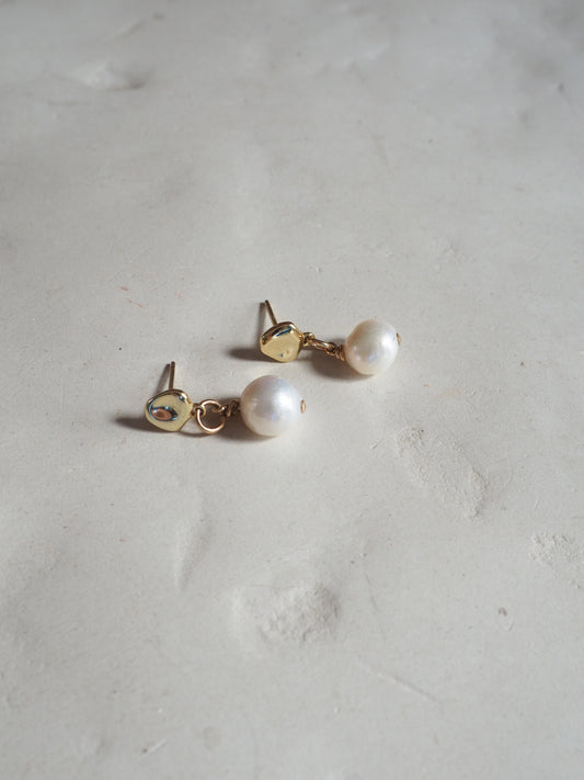 White pearl stud earrings